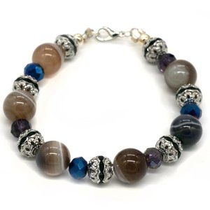 Bracelet with earth color stones and rhinestones.